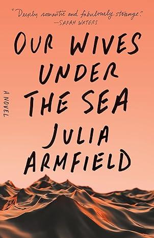 The cover of Our Wives Under the Sea by Julia Armfield, a choppy close up picture of the ocean in an orange half light 