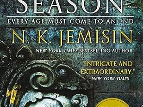 Cover of the book "The Fifth Season" by N.K. Jemisin. A symbol before a bluegreen background