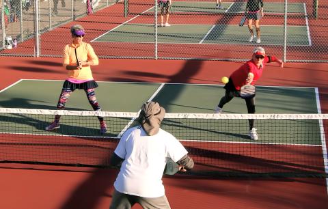 People playing pickleball