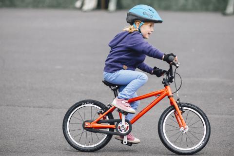 child riding bike