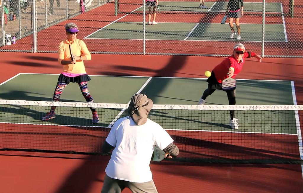 People playing pickleball